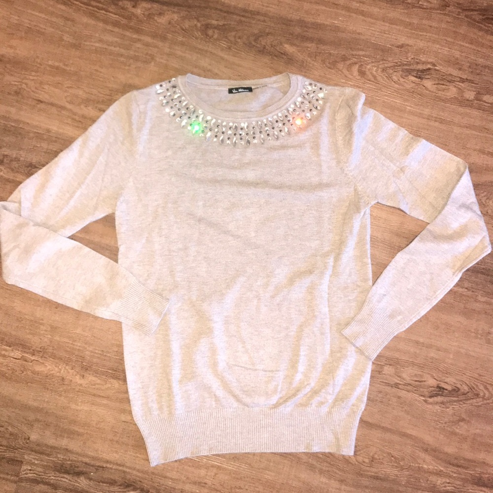 Light brown sweater with jewel details